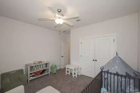 Bedroom - 5978 W Cambridge Way, Pace, FL 32571 photo 7 of 10