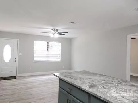 Living - 5143 Oakleaf Dr, Pace, FL 32571 photo 7 of 9