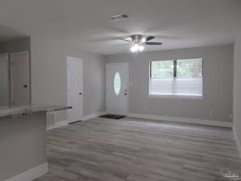 Living - 5143 Oakleaf Dr, Pace, FL 32571 photo 2 of 9