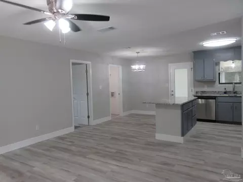 Living - 5143 Oakleaf Dr, Pace, FL 32571 photo 5 of 9