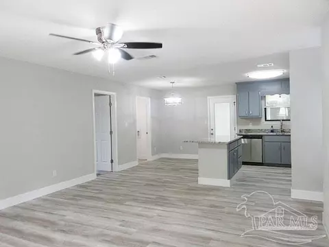 Living - 5143 Oakleaf Dr, Pace, FL 32571 photo 8 of 9