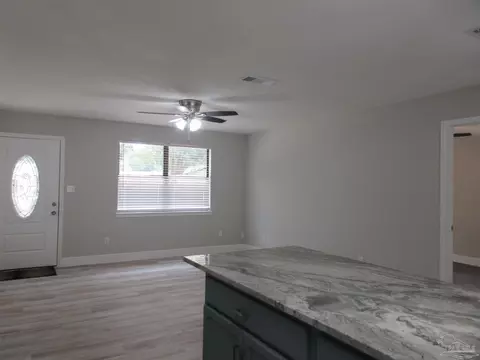 Living - 5143 Oakleaf Dr, Pace, FL 32571 photo 3 of 9
