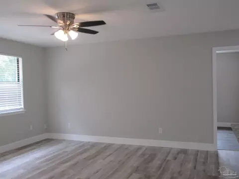Living - 5143 Oakleaf Dr, Pace, FL 32571 photo 4 of 9