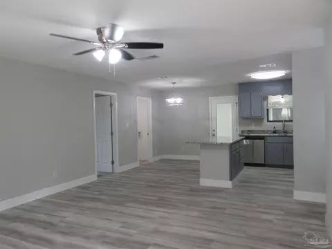 Living - 5143 Oakleaf Dr, Pace, FL 32571 photo 1 of 9