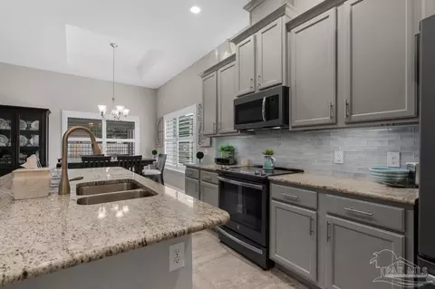 Kitchen - 5691 Dunridge Dr, Pace, FL 32571 photo 2 of 3