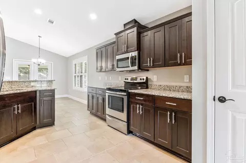 Kitchen - 5695 Tucker Cir, Pace, FL 32571 photo 2 of 3