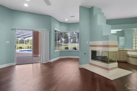 Living - 5542 Oakmont Dr, Pace, FL 32571 photo 6 of 8