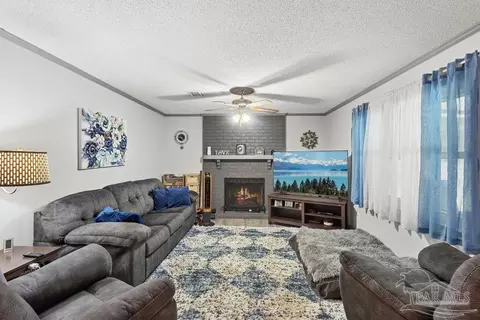 Living - 5329 Casper Cir, Milton, FL 32570 photo 3 of 4