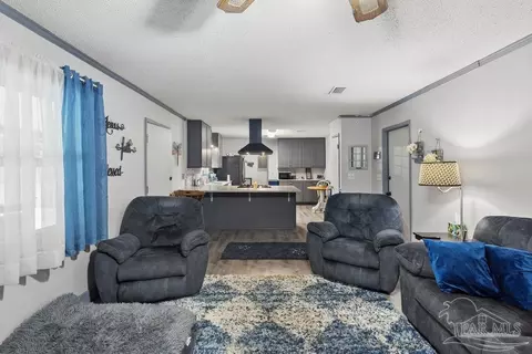 Living - 5329 Casper Cir, Milton, FL 32570 photo 1 of 4