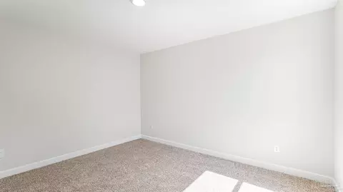 Bedroom - 5868 Tripletail Dr, Milton, FL 32583 photo 11 of 15