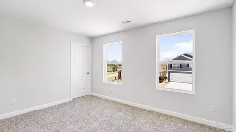 Bedroom - 5868 Tripletail Dr, Milton, FL 32583 photo 13 of 15