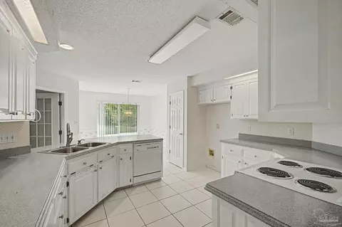 Kitchen - 5775 Whispering Woods Dr, Pace, FL 32571 photo 5 of 6