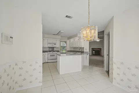 Kitchen - 5775 Whispering Woods Dr, Pace, FL 32571 photo 1 of 6