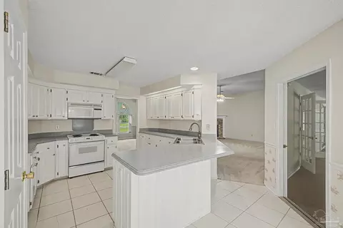 Kitchen - 5775 Whispering Woods Dr, Pace, FL 32571 photo 2 of 6