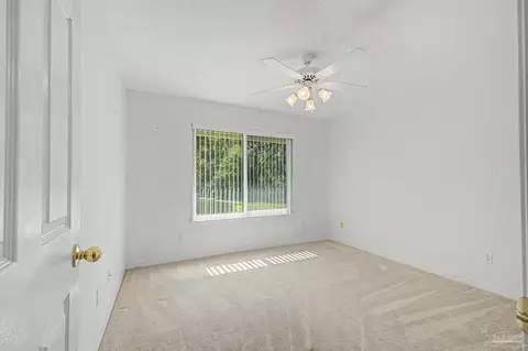 Bedroom - 5775 Whispering Woods Dr, Pace, FL 32571 photo 3 of 6