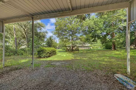 Exterior - 5775 Whispering Woods Dr, Pace, FL 32571 photo 13 of 22