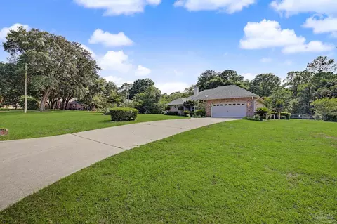 Exterior - 5775 Whispering Woods Dr, Pace, FL 32571 photo 2 of 22