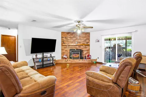 Living - 5649 Dove Dr, Pace, FL 32571 photo 2 of 5