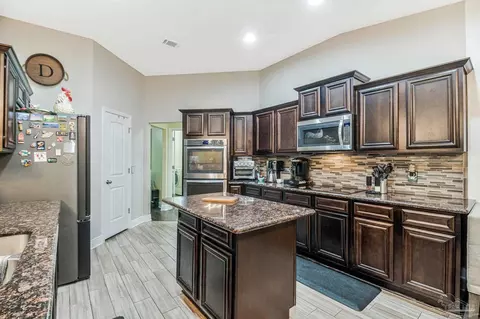 Kitchen - 5595 Cane Syrup Cir, Pace, FL 32571 photo 3 of 6