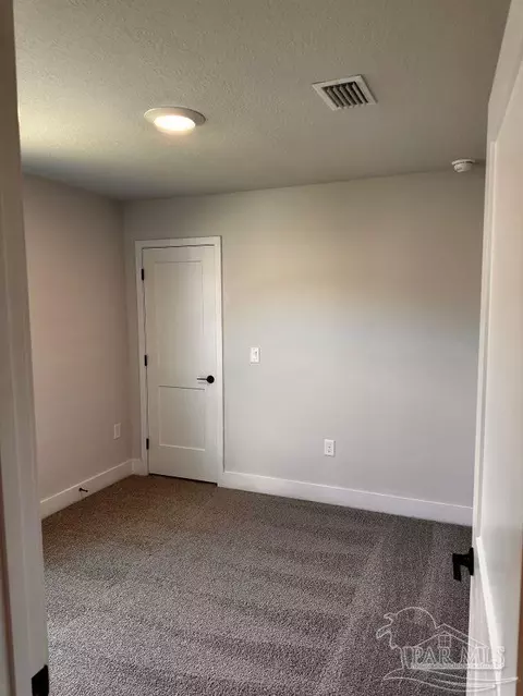 Bedroom - 909 Rustling Pine Rd #2C, Cantonment, FL 32533 photo 2 of 2