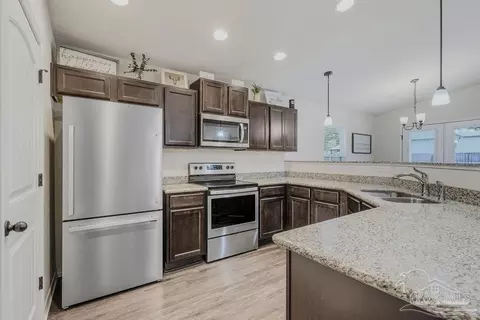 Kitchen - 4378 Thistle Pine Ct, Pace, FL 32571 photo 3 of 4