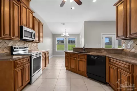 Kitchen - 3310 Indian Hills Dr, Pace, FL 32571 photo 3 of 3
