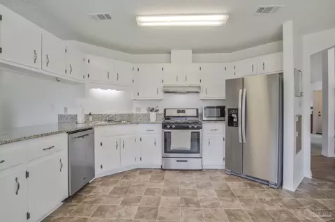 Kitchen - 5688 Dove Dr, Pace, FL 32571 photo 1 of 3