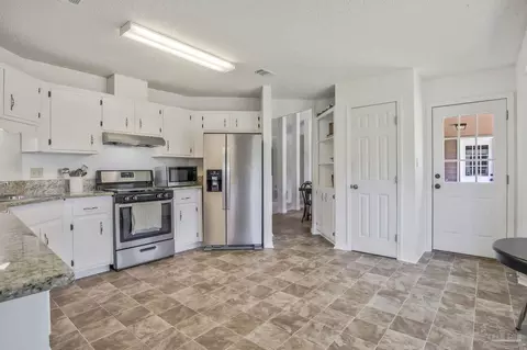 Kitchen - 5688 Dove Dr, Pace, FL 32571 photo 2 of 3