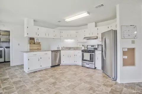 Kitchen - 5688 Dove Dr, Pace, FL 32571 photo 3 of 3