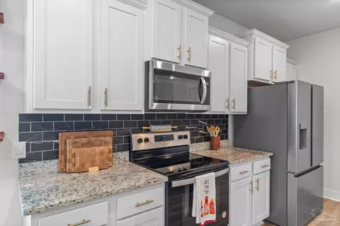 Kitchen - 7780 Saddlebrook Ave, Pace, FL 32571 photo 3 of 4