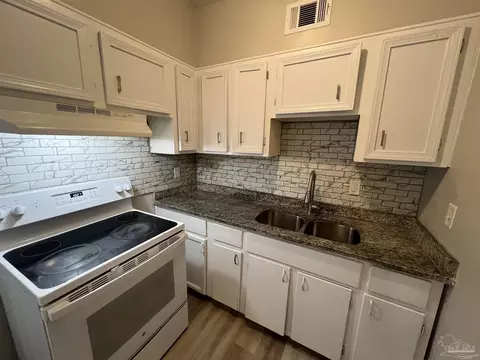 Kitchen - 219 Ruby Ave, Pensacola, FL 32505 photo 2 of 2