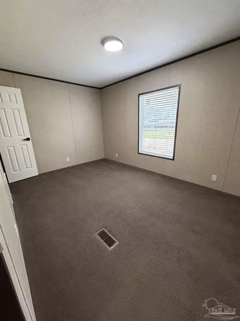 Bedroom - 6225 Goliath Rd, Milton, FL 32583 photo 5 of 6