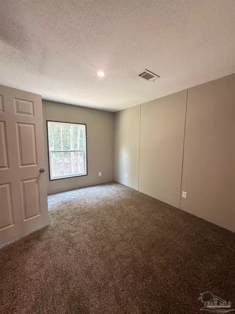Bedroom - 5337 Old Oak Rd, Milton, FL 32583 photo 3 of 4