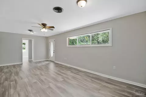 Living - 6480 Cypress St, Milton, FL 32570 photo 3 of 3