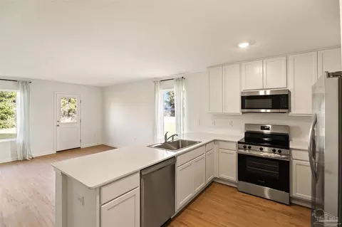 Kitchen - 4665 Eagles Ridge Rd, Pace, FL 32571 photo 2 of 2