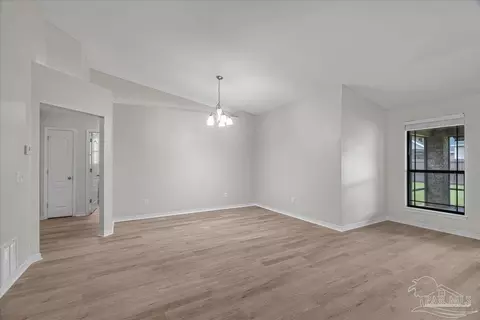 Living - 6077 Stonechase Blvd, Pace, FL 32571 photo 9 of 11