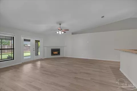 Living - 6077 Stonechase Blvd, Pace, FL 32571 photo 6 of 11