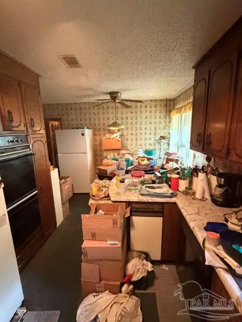 Kitchen - 3482 Smyer Dr, Pace, FL 32571 photo 3 of 3