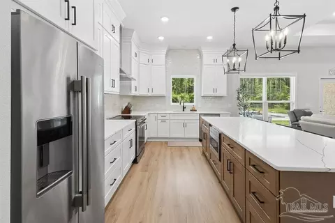 Kitchen - 8992 Sage Forest Ln, Pace, FL 32571 photo 7 of 7