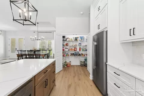 Kitchen - 8992 Sage Forest Ln, Pace, FL 32571 photo 5 of 7
