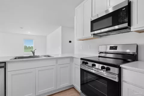 Kitchen - 6494 Buckthorn Cir #HS 26C, Pace, FL 32571 photo 7 of 7