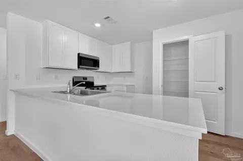 Kitchen - 6494 Buckthorn Cir #HS 26C, Pace, FL 32571 photo 5 of 7