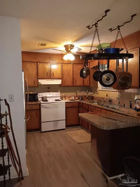 Kitchen - 5896 Cedar Tree Dr, Milton, FL 32570 photo 3 of 3