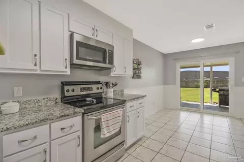 Kitchen - 4605 Laquinta Ct, Pace, FL 32571 photo 3 of 5