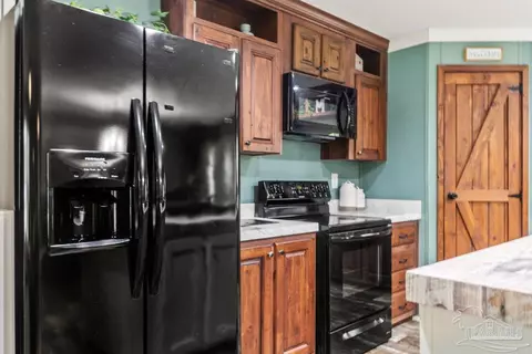 Kitchen - 2138 S Century Blvd, Mcdavid, FL 32568 photo 2 of 4