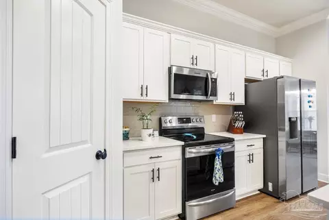 Kitchen - 4609 Sago Palm Cir, Pace, FL 32571 photo 5 of 5