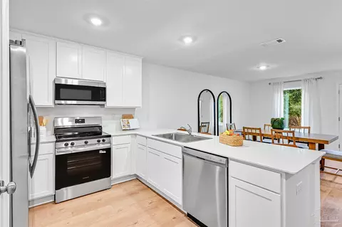 Kitchen - 6489 Buckthorn Cir #HS 10J, Pace, FL 32571 photo 3 of 7