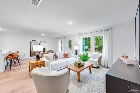 Living - 6489 Buckthorn Cir #HS 10J, Pace, FL 32571 photo 2 of 6