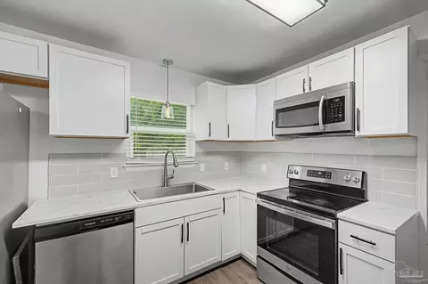 Kitchen - 4743 Pecanwood Pl, Pace, FL 32571 photo 3 of 5