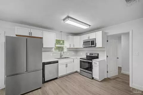 Kitchen - 4743 Pecanwood Pl, Pace, FL 32571 photo 2 of 5